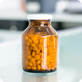 small-pills-amber-medicine-bottle